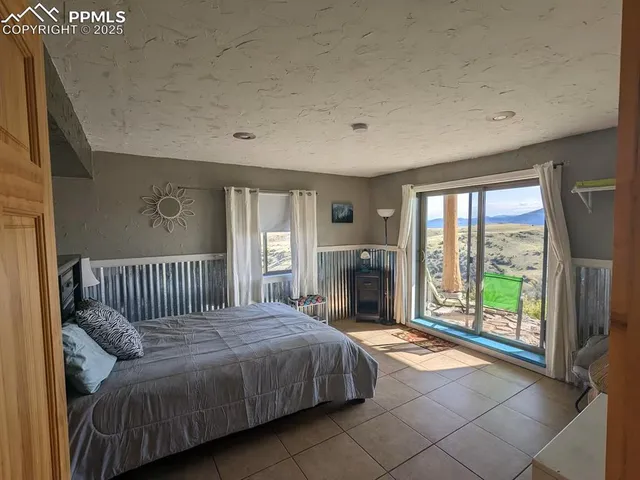 a view of entryway with a wooden door
