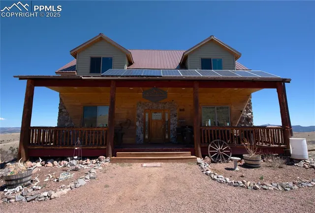 a bedroom with a large bed and a large window