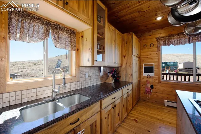 a view of a hallway with washer and dryer