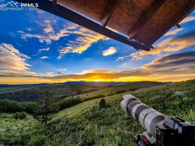 a living room with furniture fireplace and flat screen tv