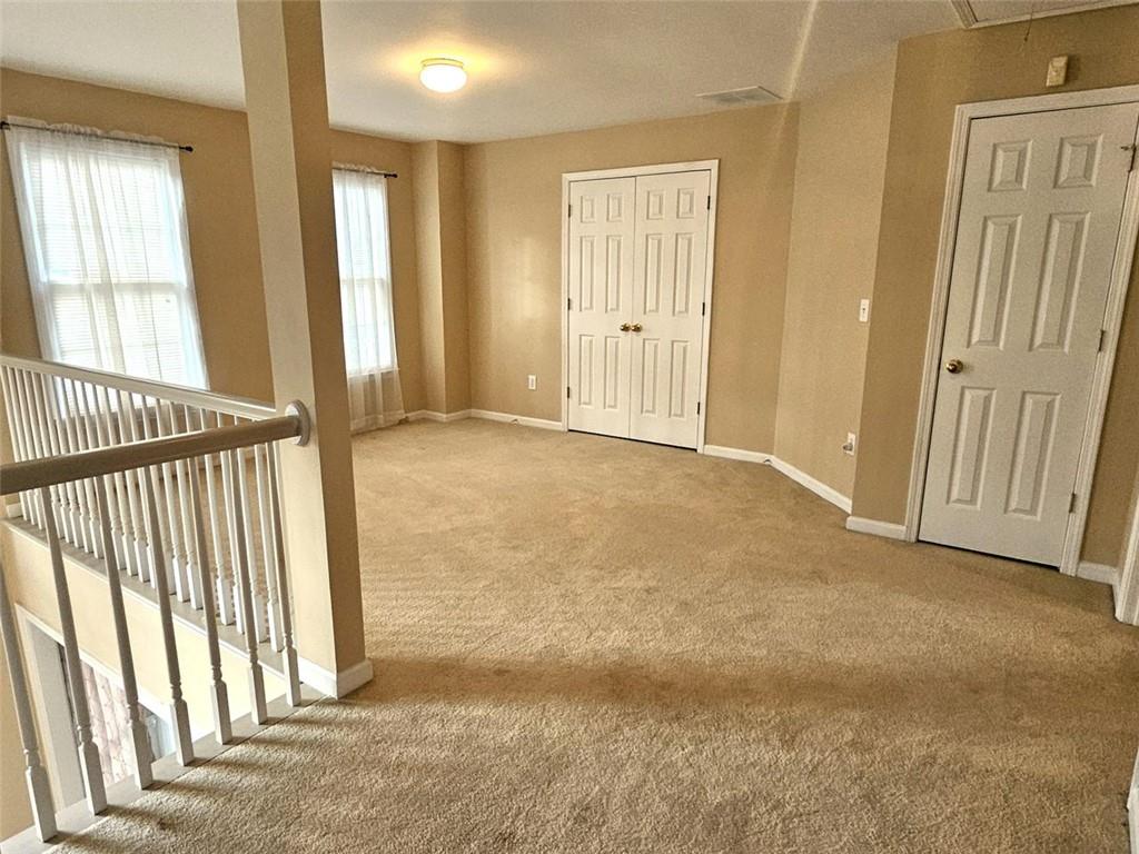 3800 Cherry Ridge Boulevard Decatur, GA 30034 - Photo 11 of 21 an empty room with windows