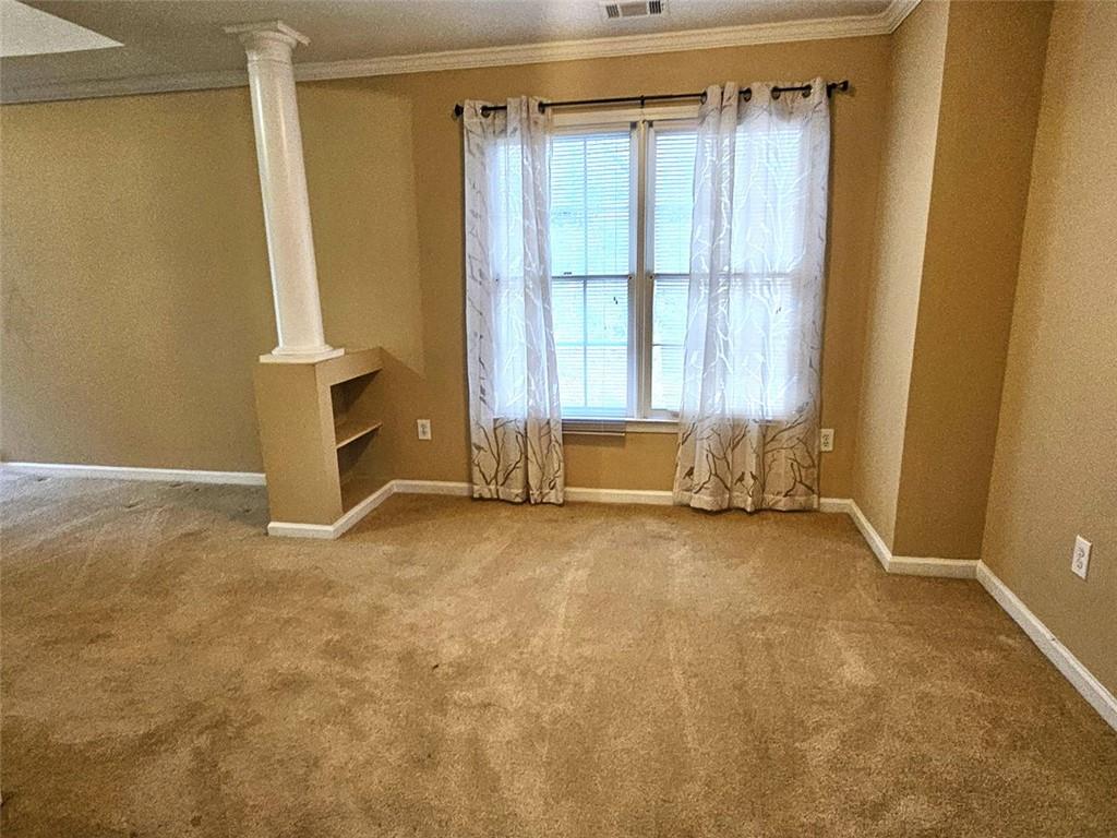 3800 Cherry Ridge Boulevard Decatur, GA 30034 - Photo 13 of 21 a view of an empty room with a window