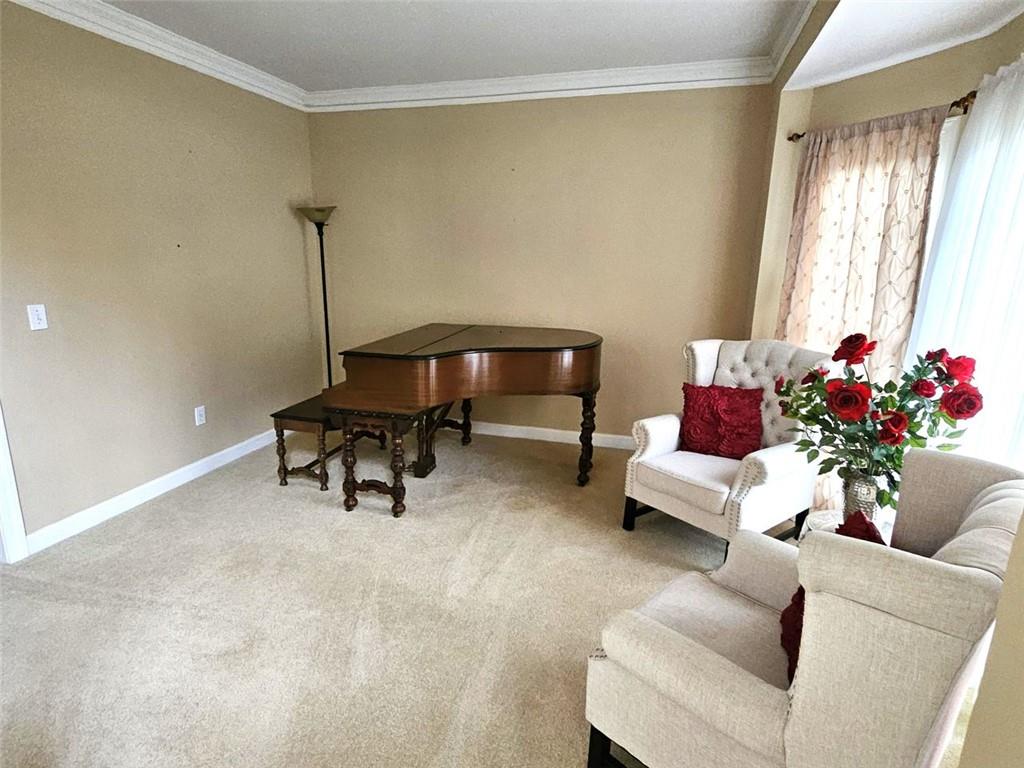3800 Cherry Ridge Boulevard Decatur, GA 30034 - Photo 3 of 21 a living room with furniture and flowers