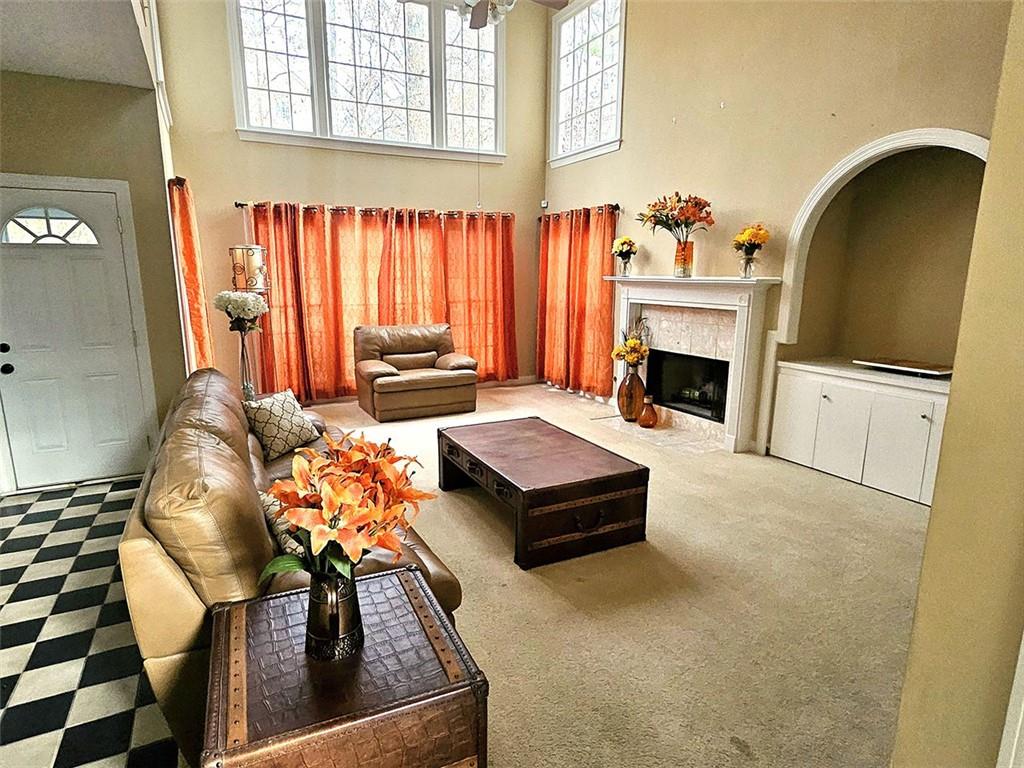 3800 Cherry Ridge Boulevard Decatur, GA 30034 - Photo 6 of 21 a living room with furniture and a fireplace