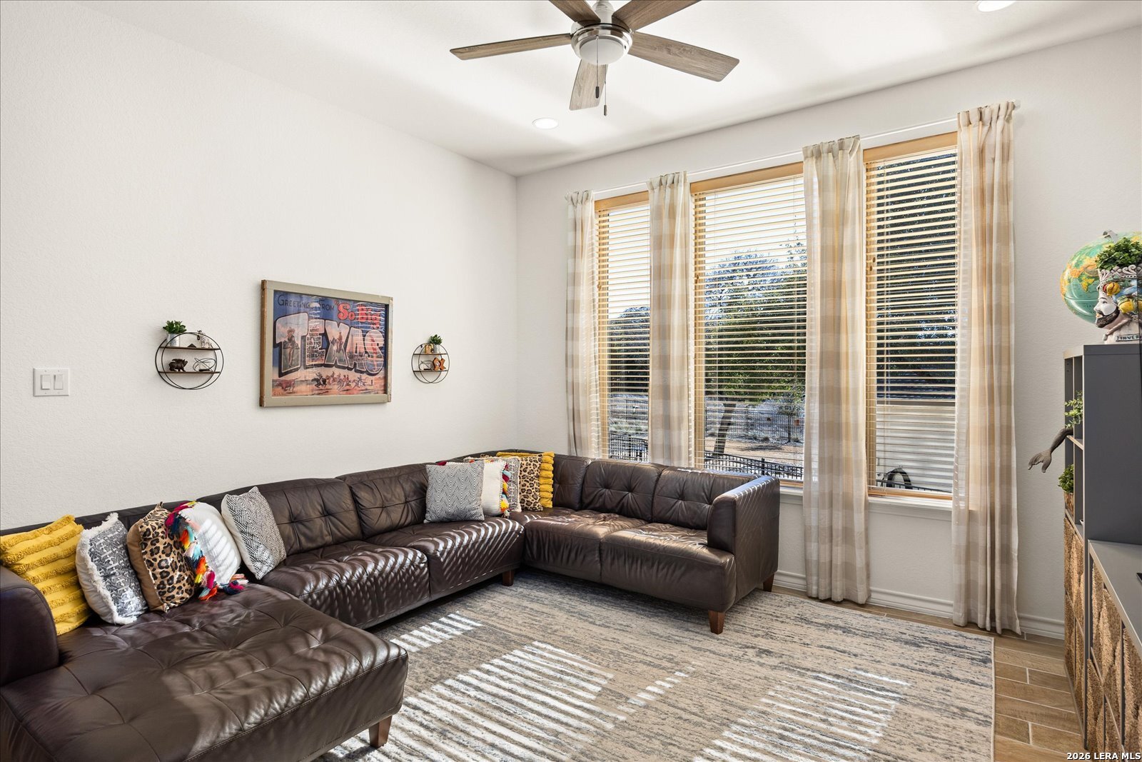 117 Amarosa Boerne, TX 78006 - Photo 17 of 62 a living room with furniture and a large window