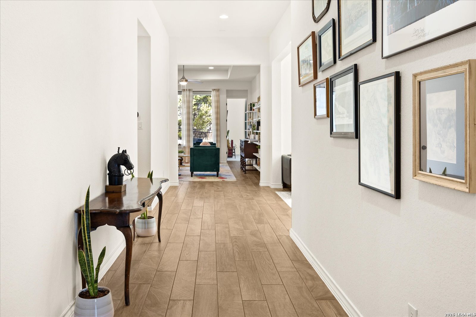 117 Amarosa Boerne, TX 78006 - Photo 8 of 62 a view of a entryway with furniture and wooden floor