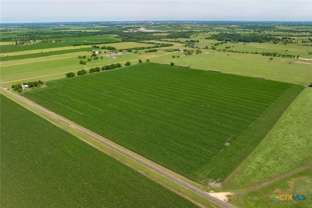 a view of an outdoor space and tennis court