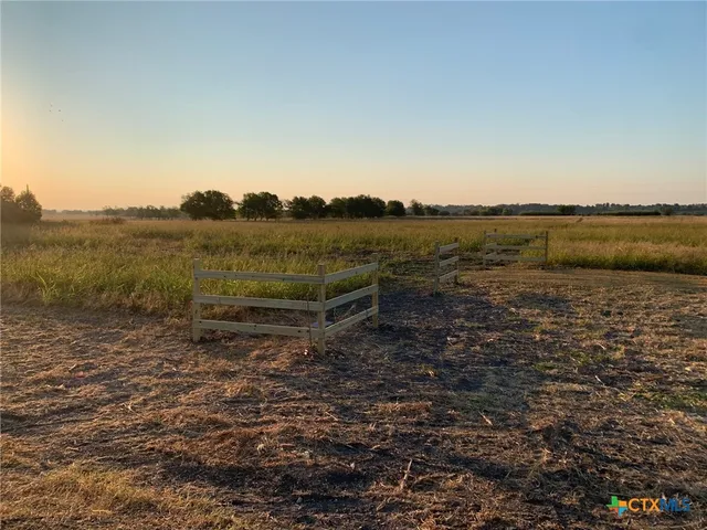a view of lake with mountain in background