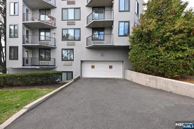 a view of a building with a street