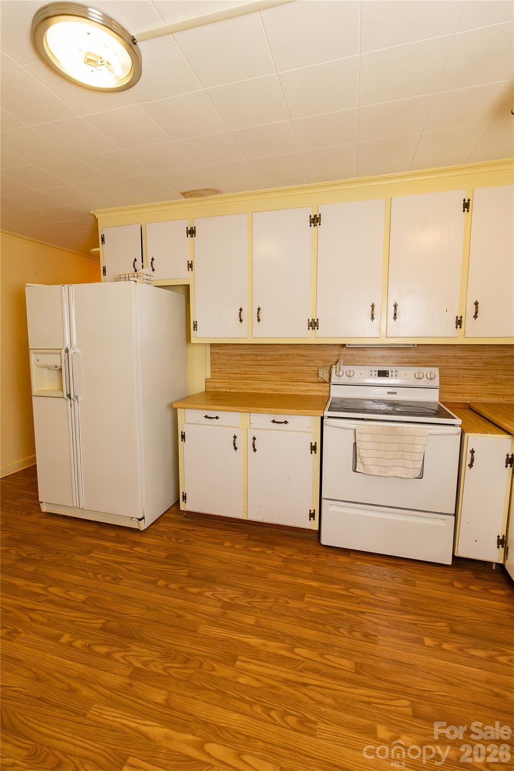 609 Wilcox Avenue Gaffney, SC 29341 - Photo 13 of 23 a view of a kitchen with wooden floor