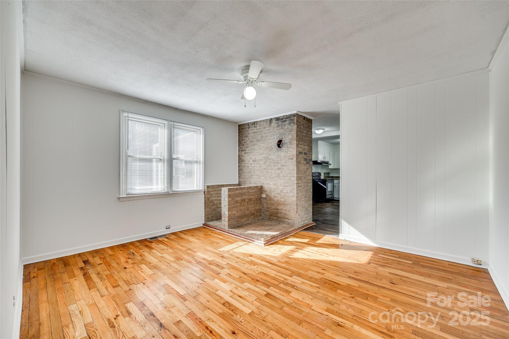 1337 Eisenhower Road Rock Hill, SC 29730 - Photo 18 of 21 a view of empty room with wooden floor and fan