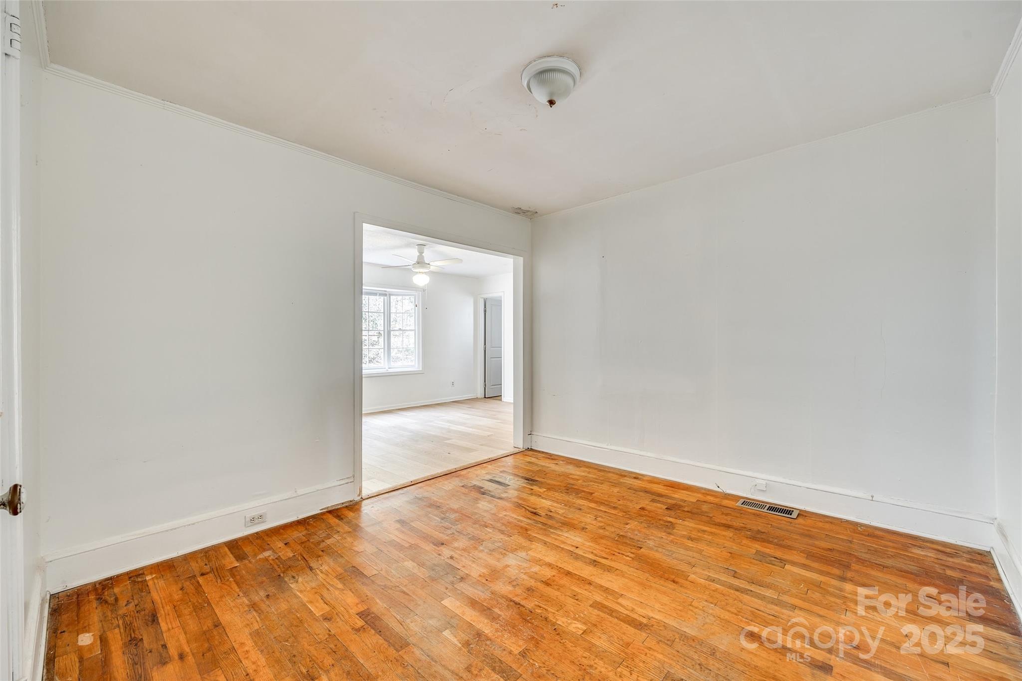 1337 Eisenhower Road Rock Hill, SC 29730 - Photo 20 of 21 an empty room with wooden floor and windows