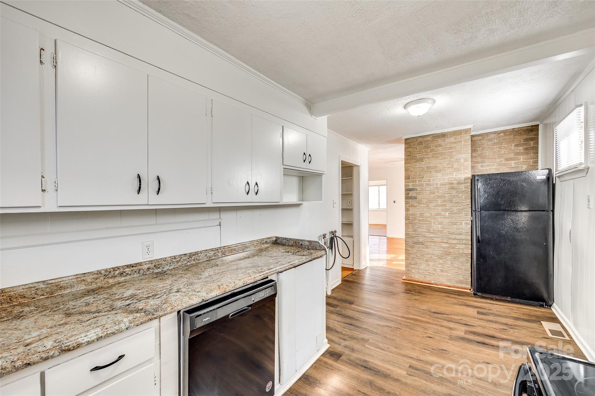 1337 Eisenhower Road Rock Hill, SC 29730 - Photo 7 of 21 a kitchen with a sink stove and refrigerator