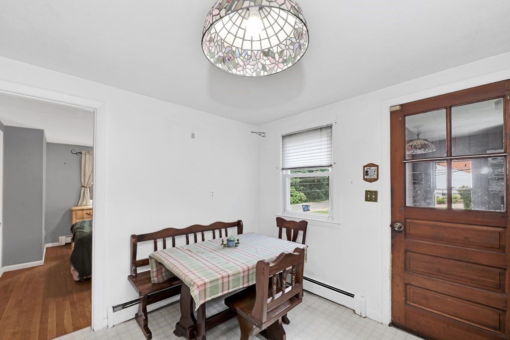 40 Dedham Street Boston, MA 02136 - Photo 14 of 24 a view of a dining room with furniture and window