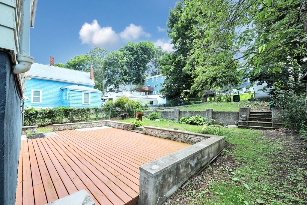 40 Dedham Street Boston, MA 02136 - Photo 19 of 24 a view of a backyard with a garden and plants