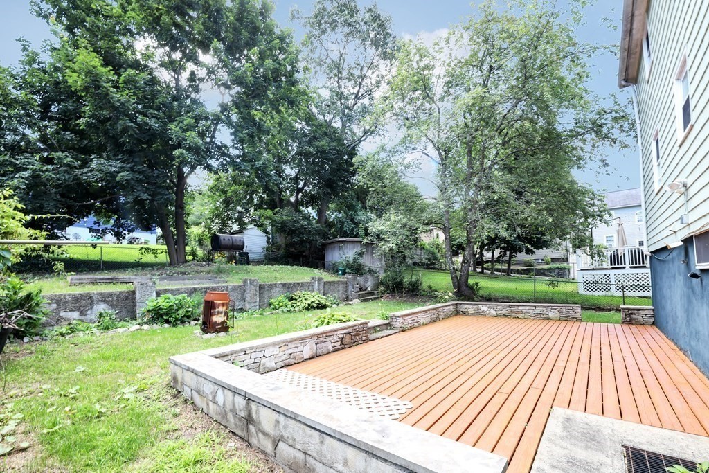 40 Dedham Street Boston, MA 02136 - Photo 23 of 24 a view of backyard with swimming pool and green space