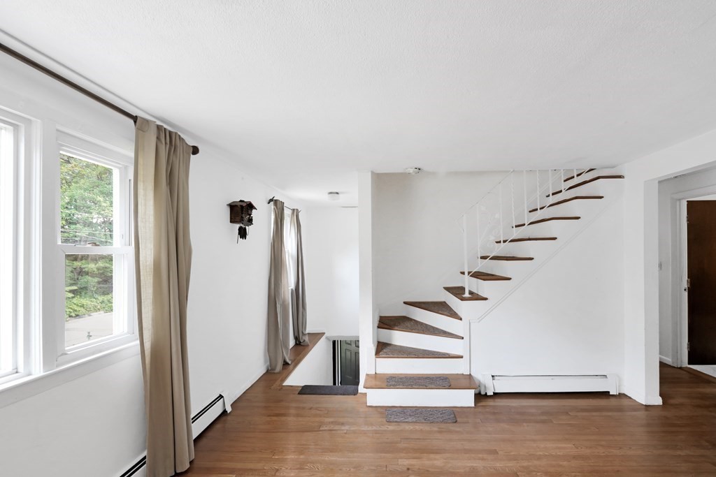 40 Dedham Street Boston, MA 02136 - Photo 7 of 24 a view of entryway with wooden floor and white walls