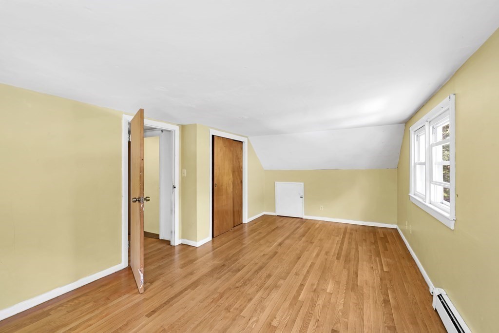 40 Dedham Street Boston, MA 02136 - Photo 8 of 24 a view of empty room with wooden floor and fan