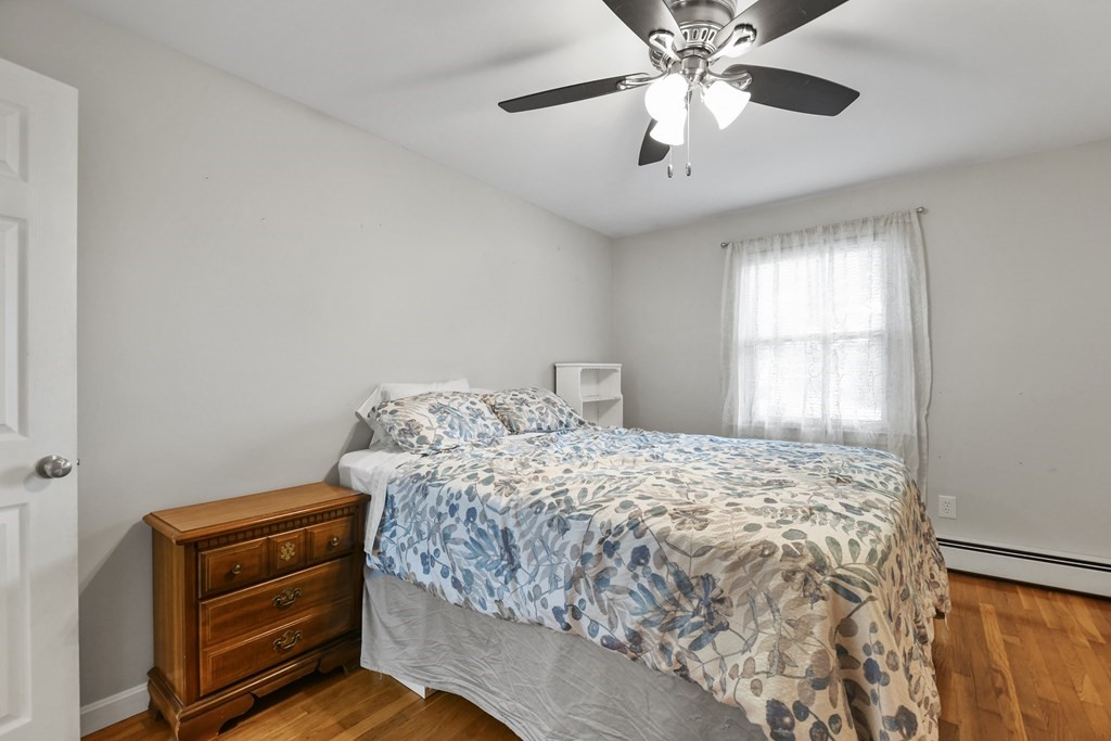 26 Westwood Road Webster, MA 01570 - Photo 13 of 30 a bedroom with a bed and a window