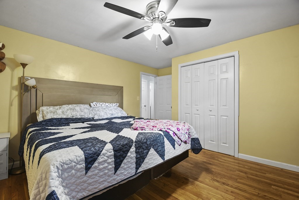 26 Westwood Road Webster, MA 01570 - Photo 15 of 30 a bedroom with a bed and a ceiling fan