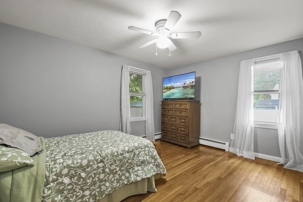 26 Westwood Road Webster, MA 01570 - Photo 16 of 30 wooden floor in an empty room with a window