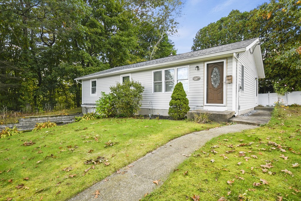 26 Westwood Road Webster, MA 01570 - Photo 22 of 30 a front view of house with yard and green space