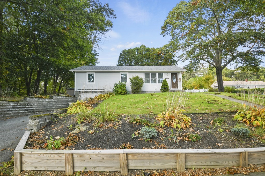 26 Westwood Road Webster, MA 01570 - Photo 23 of 30 front view of a house with a yard
