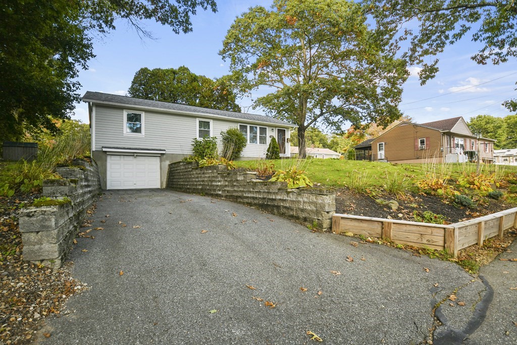 26 Westwood Road Webster, MA 01570 - Photo 24 of 30 front view of a house with a yard