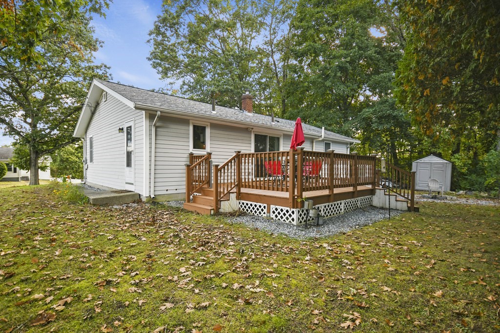 26 Westwood Road Webster, MA 01570 - Photo 25 of 30 a view of a house with a yard and sitting area