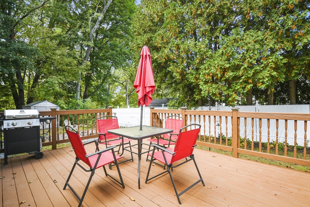 26 Westwood Road Webster, MA 01570 - Photo 30 of 30 a view of a patio with a table and chairs