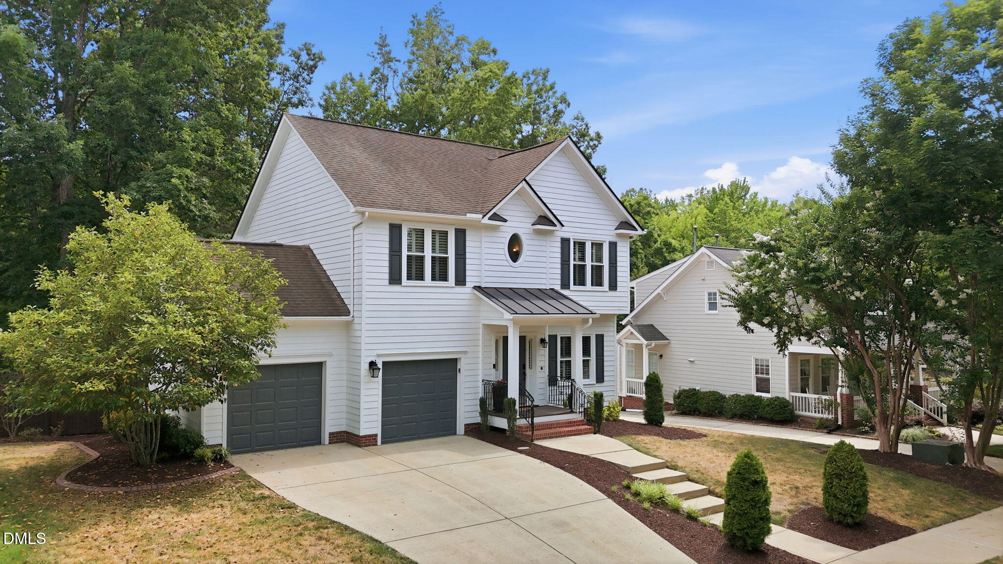 1716 Farmington Grove Drive Raleigh, NC 27614 - Photo 3 of 41 a front view of a house with a yard