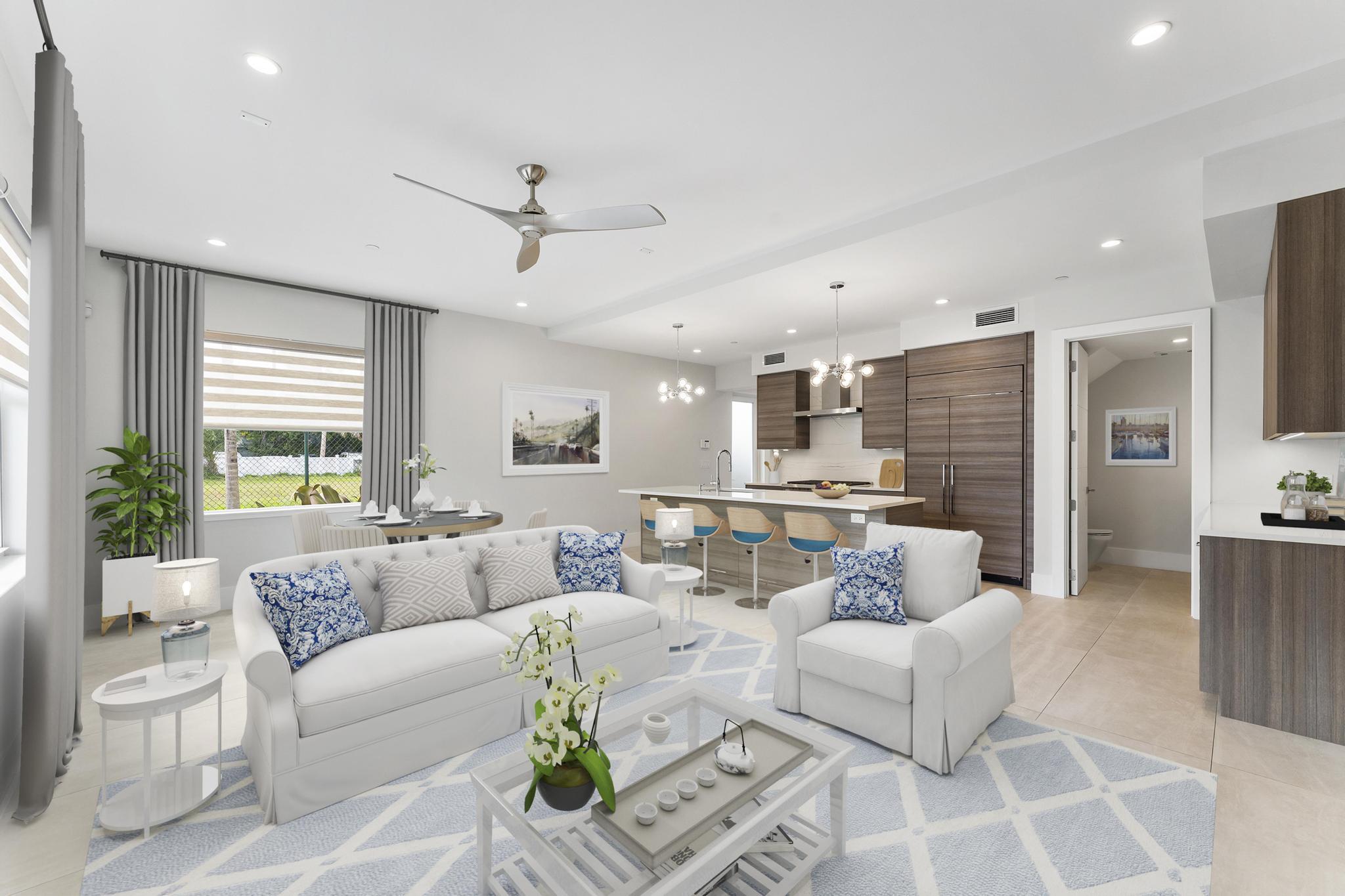 53 Southeast Seminole Street, Unit A Stuart, FL 34994 - Photo 17 of 75 a living room with furniture and a large window