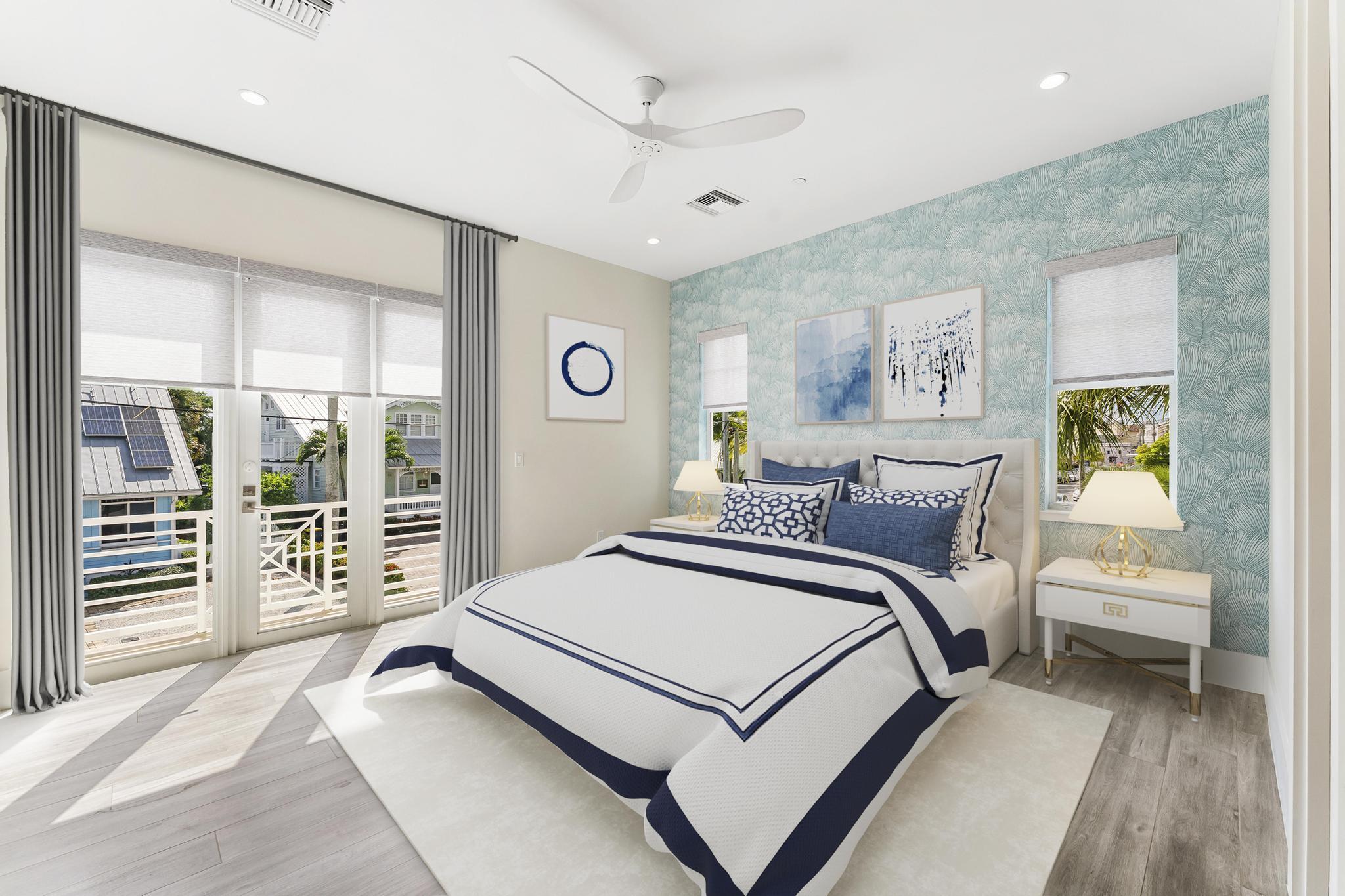 53 Southeast Seminole Street, Unit A Stuart, FL 34994 - Photo 29 of 75 a spacious bedroom with a bed and a large window