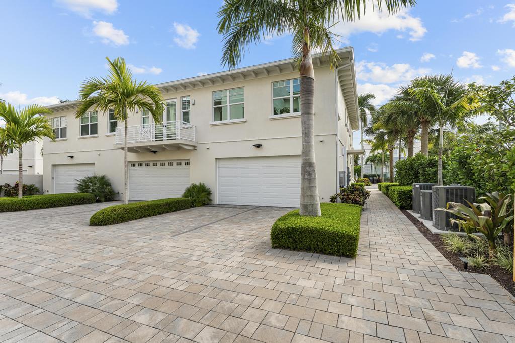 53 Southeast Seminole Street, Unit A Stuart, FL 34994 - Photo 61 of 75 a house view with a garden space