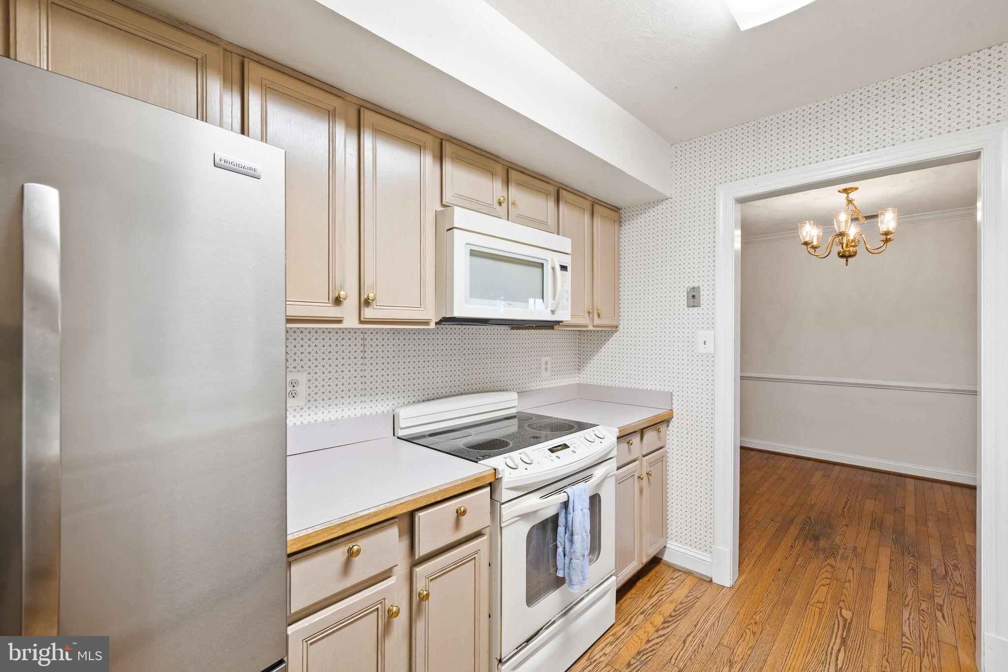 6397 Tazewell Street Warrenton, VA 20187 - Photo 12 of 41 Charming kitchen with classic cabinetry.