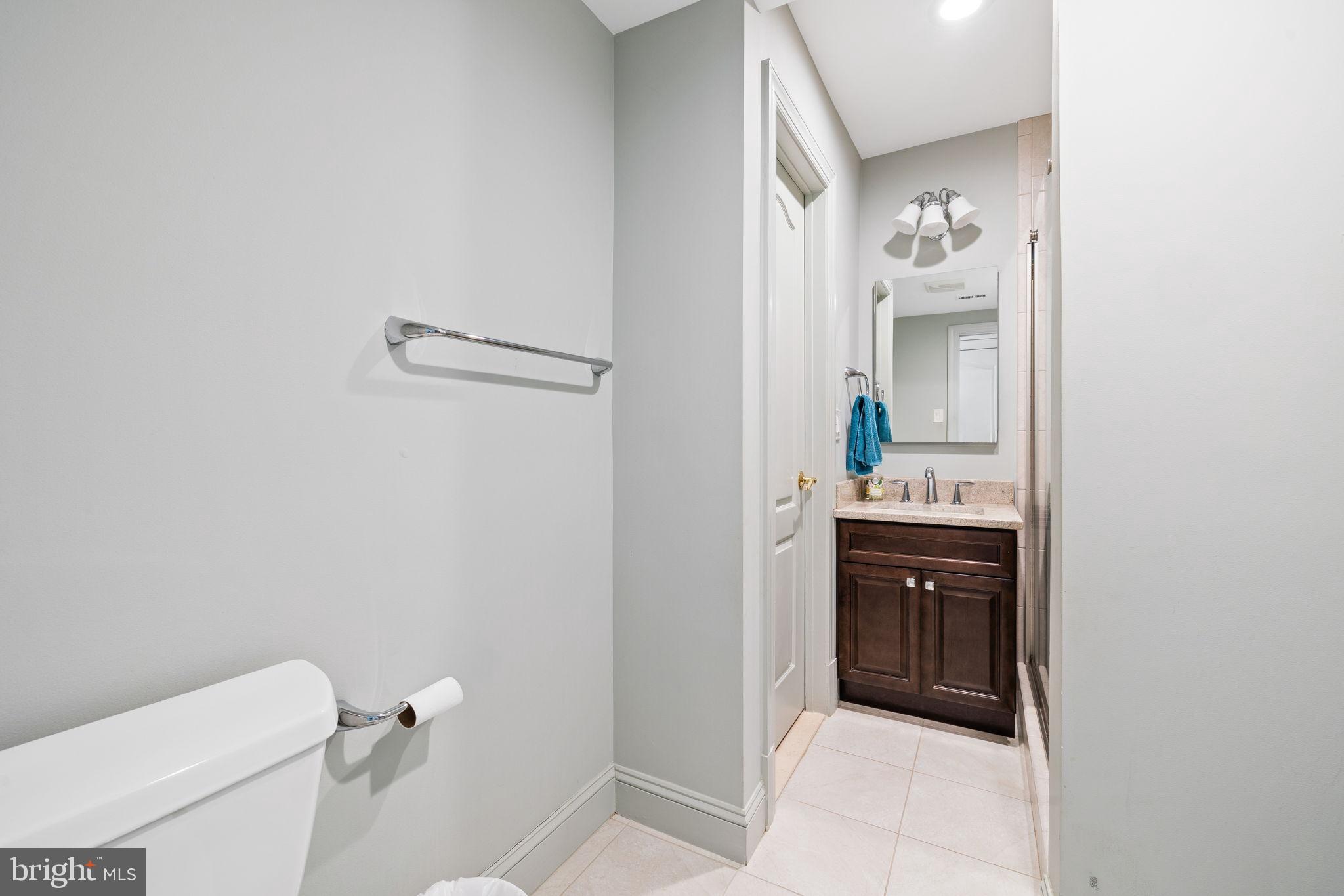 6397 Tazewell Street Warrenton, VA 20187 - Photo 13 of 41 Sleek and modern half-bath retreat.