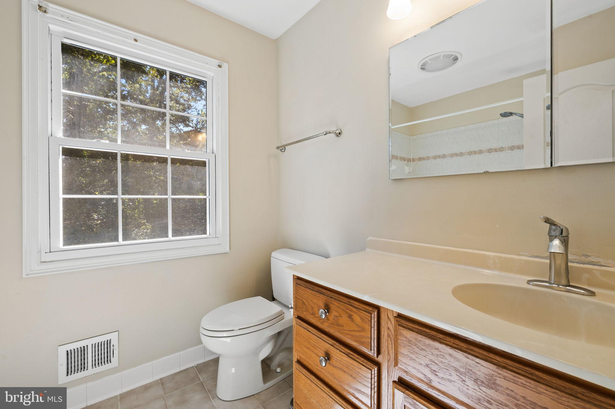 6397 Tazewell Street Warrenton, VA 20187 - Photo 22 of 41 Bright and airy bathroom with natural light.
