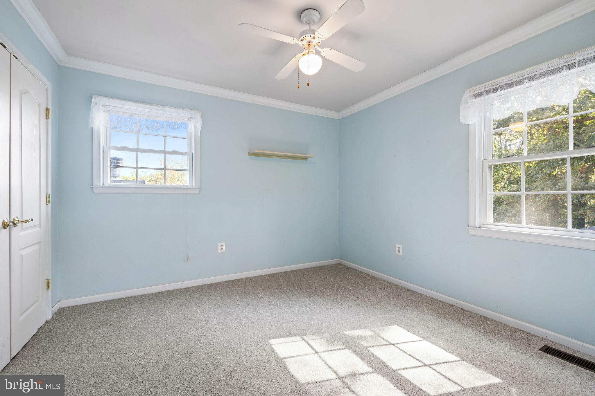6397 Tazewell Street Warrenton, VA 20187 - Photo 25 of 41 Bright and airy room with serene blue walls.