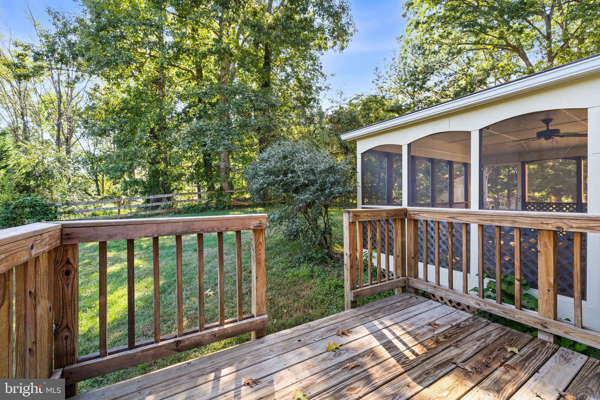 6397 Tazewell Street Warrenton, VA 20187 - Photo 30 of 41 Serene deck overlooking lush greenery.