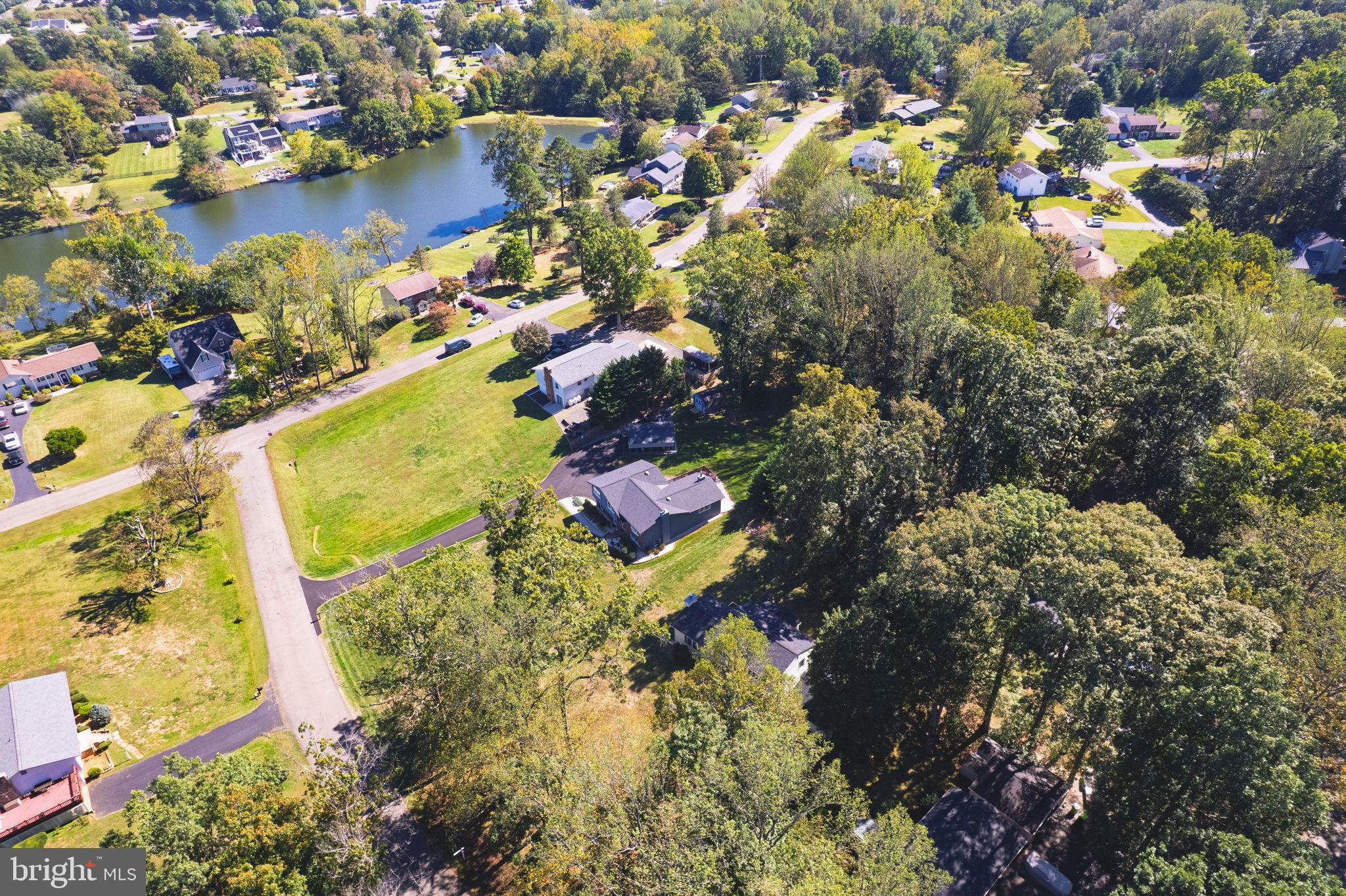 6397 Tazewell Street Warrenton, VA 20187 - Photo 39 of 41 Serene suburban landscape by the lake.