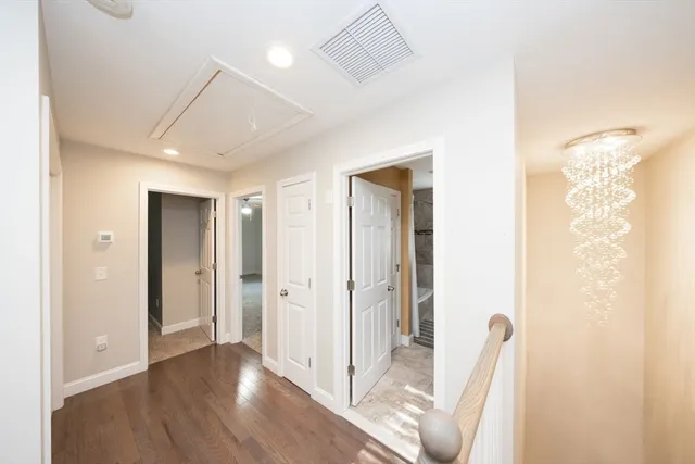 a view of entryway with wooden floor