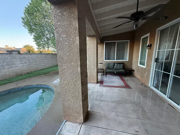 a view of a balcony with chairs
