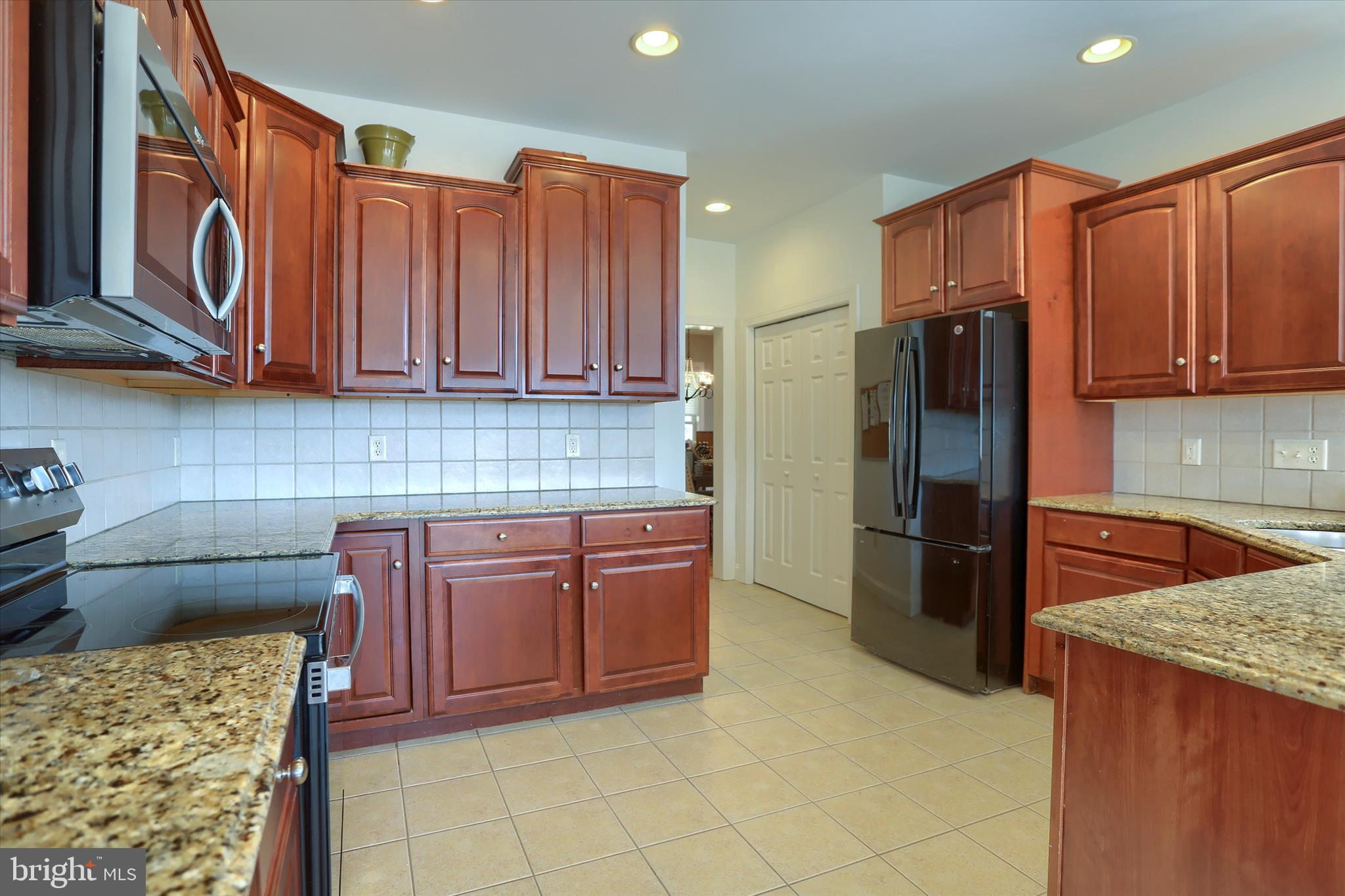 30 Mockingbird Lane Palmyra, PA 17078 - Photo 25 of 113 a kitchen with stainless steel appliances granite countertop a refrigerator and a sink