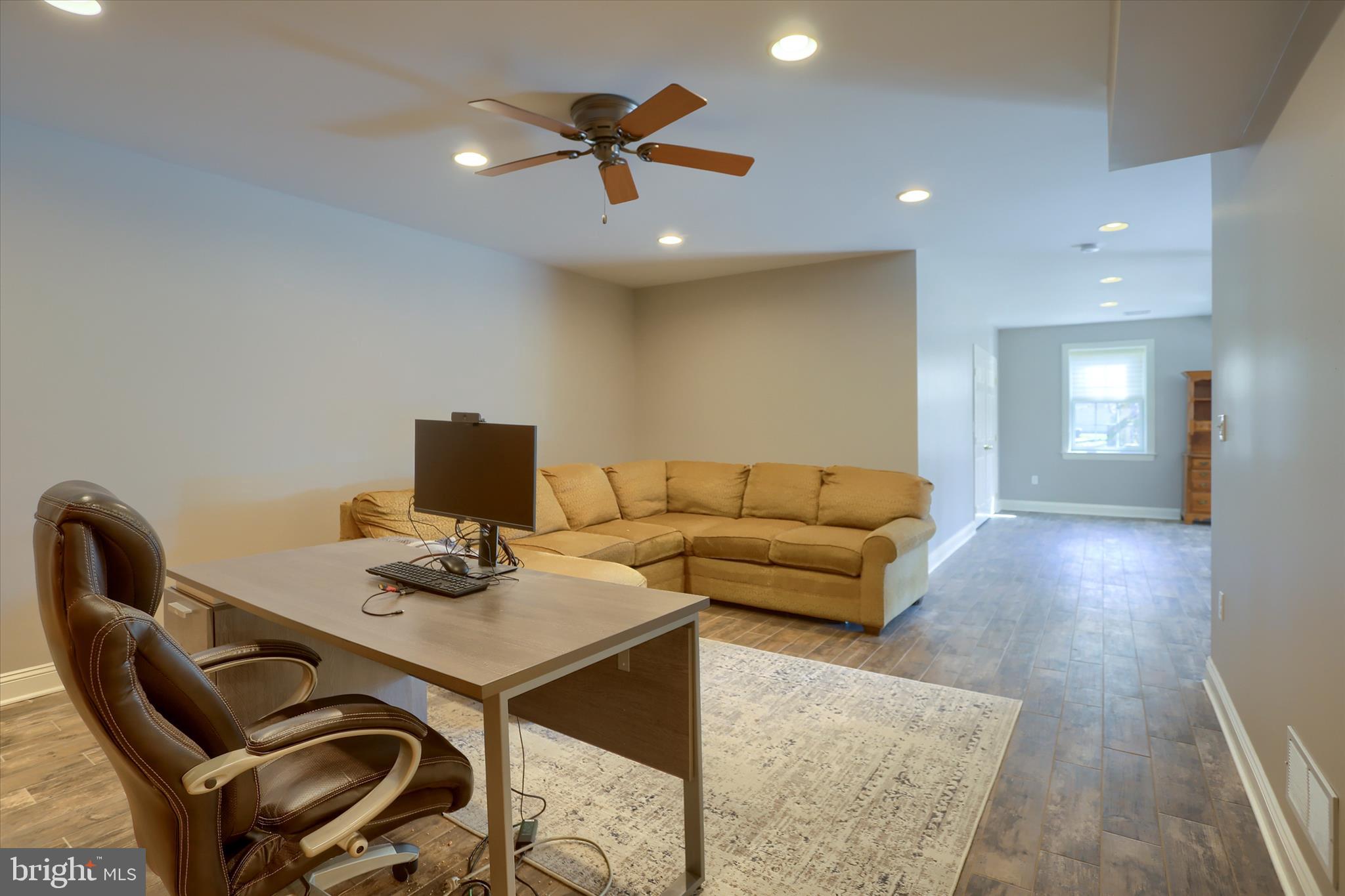 30 Mockingbird Lane Palmyra, PA 17078 - Photo 66 of 113 a living room with furniture and a wooden floor