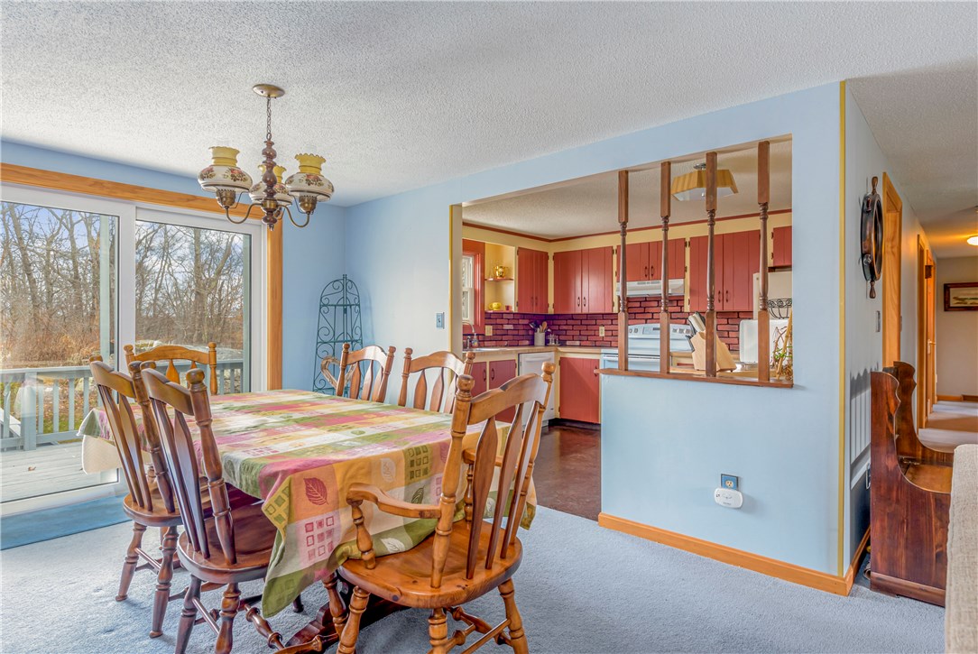 46 Indian Hill Road Tiverton, RI 02878 - Photo 20 of 21 Dining area. Open floor plan to kitchen and living room.