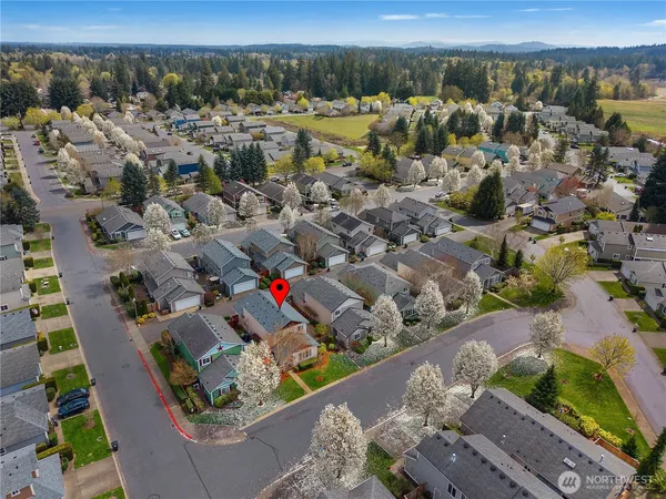 an aerial view of a houses with outdoor space