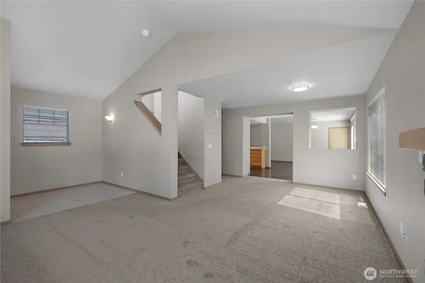 an empty room with windows