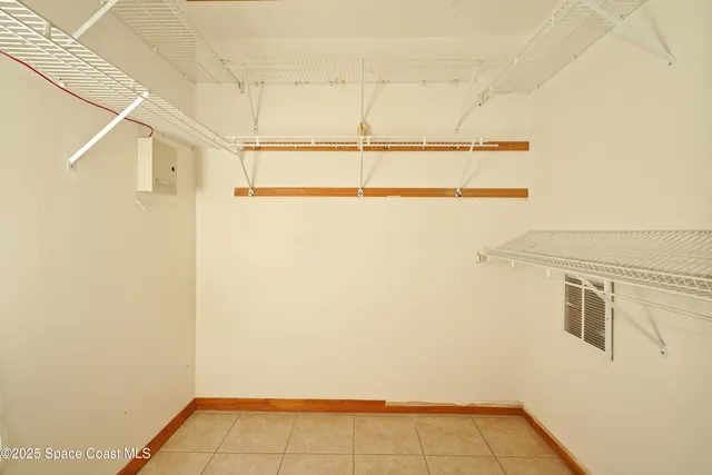 a view of a room with racks on the wall