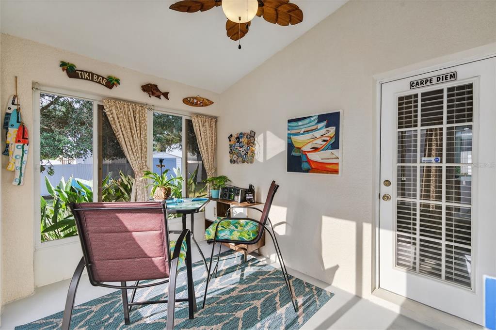 12629 White Bluff Road Hudson, FL 34669 - Photo 15 of 38 a view of a dining room with furniture window and outside view