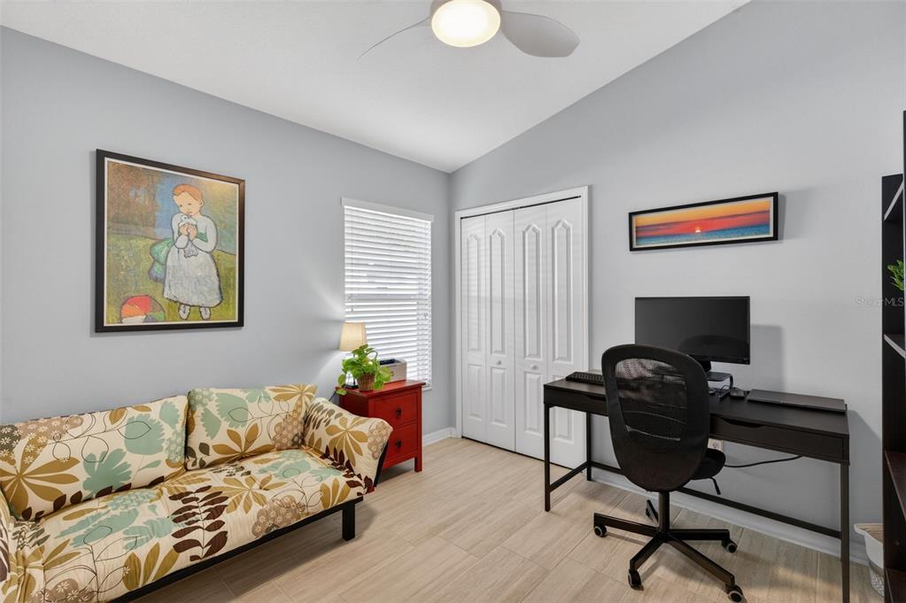 12629 White Bluff Road Hudson, FL 34669 - Photo 17 of 38 a living room with furniture and a hard wood floor